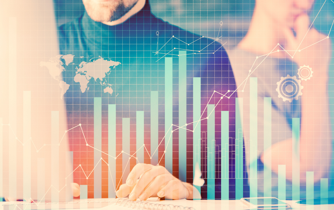 Salt & Ledger Accountant monitoring financial charts in Santa Cruz & Monterey Counties.